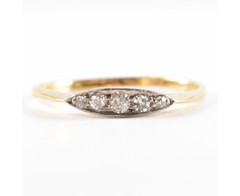 1920s gold and platinum five stone diamond ring. The ring set with five old cut diamonds having knife bar shoulders to plain 