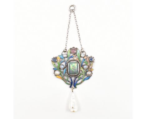 An Arts &amp; Crafts enamel &amp; stone set pendant. The antique pendant having a central rectangular bezel set opal cabochon