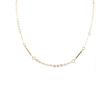 An 18ct gold bar link necklace chain. The chain having round and spacer links with a spring ring clasp. Marked 750 to jump ri