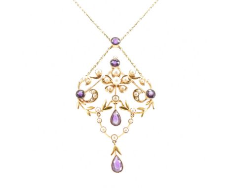 A 19th century Victorian amethyst and pearl Art Nouveau pendant necklace. The necklace formed of swags and foliates set with 