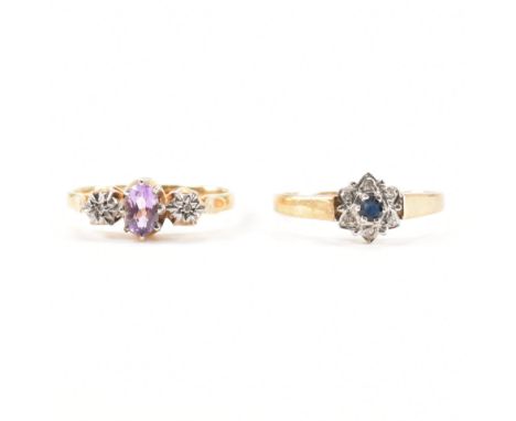 Two hallmarked 9ct yellow gold gem set rings. The first ring having a central round cut sapphire surrounded by a floral halo 