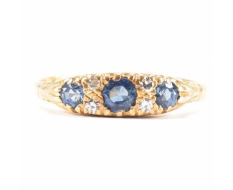 A 19th Century Victorian hallmarked 22ct gold sapphire and diamond ring. The ring being set with three round cut sapphires an