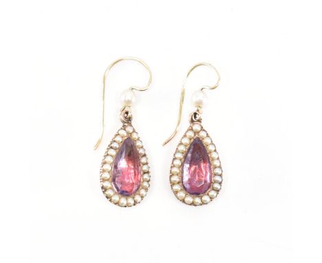 A pair of 19th Century Georgian gold, foil back crystal and pearl drop earrings. The earring having hooks to top with pear cu