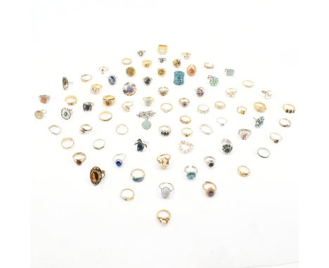 A large collection of vintage and modern costume jewellery rings. The rings to include gold and silver tone some being gem se