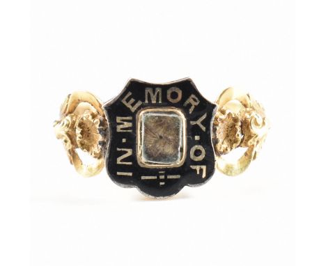 A hallmarked 18ct yellow gold, enamel &amp; hair work mourning ring. The ring having a central rectangular glazed panel of br