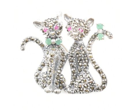 A 925 silver, marcasite, ruby &amp; emerald set cat brooch pin. The brooch in the form of two cats sat side by side set throu