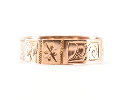 A Victorian hallmarked 9ct rose gold band ring. The ring having engraved panels hallmarked Birmingham 1879. Maker W.M.