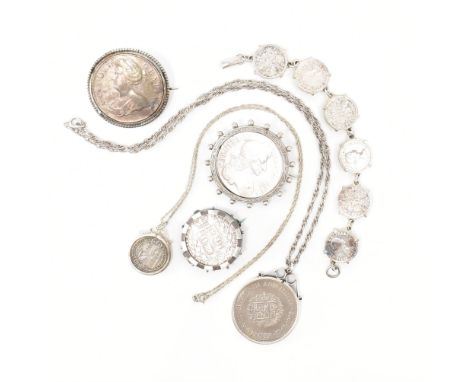 A collection of coin set jewellery. The jewellery to include a 1706 Queen Anne Crown in a silver mount.&nbsp; A Carolvus II C