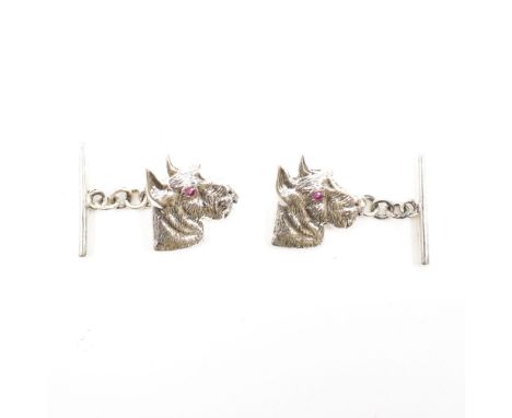 A pair of sterling silver &amp; ruby set terrier cufflinks. The cufflinks having terrier dog heads set with round cut rubies 