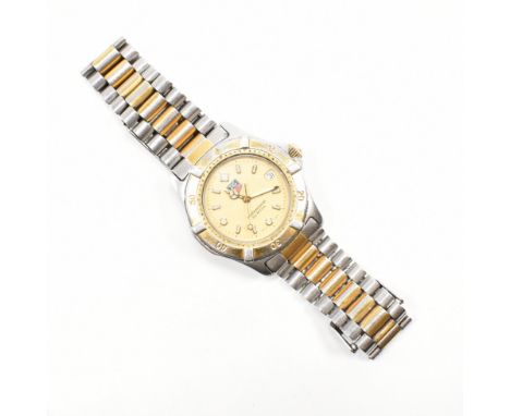 A Tag Heuer&nbsp; 2000 wrist watch. The wrist watch having a date window to 3 o'clock&nbsp; having a white enamel hands and i