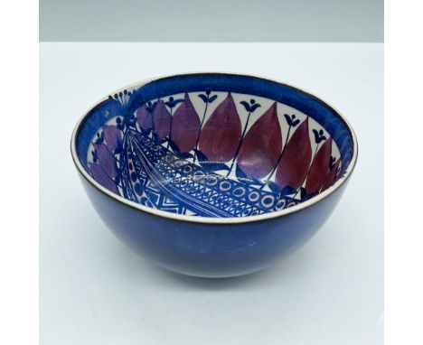 Features a glossy rich blue color, enhanced by its intricate design interior. Royal Copenhagen backstamp. Marked Fajance 189/