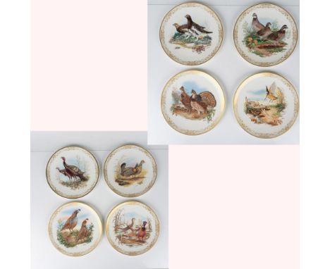 A set of 8 English bone China from the plate collection. Depicts various gamebirds with a girl foliate boarder. Birds present