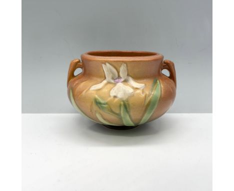 Darling planter designed with a beautiful flower growing alongside the body of the vase. Roseville backstamp. Issued: 20th ce