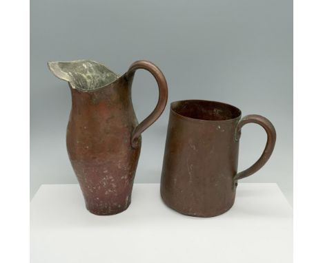 Charming set of long handled vessels consisting of a hammerhead jug and a tankard mug that are used to carry water. Largest i