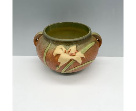 Magnificent blue and green double handled planter with mold work exhibiting a beautiful flower. Roseville backstamp. Issued: 