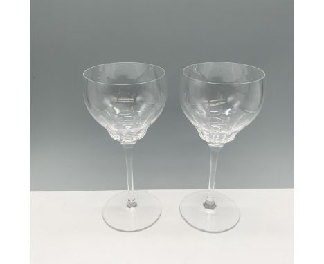 Lovely duo of long stemmed clear glasses with a wide brim. Cartier etching on base of both glasses. Dimensions: 3"W x 7.5"HMa