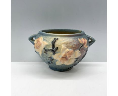 Lovely double handled planter adorned with white and pink flowers around the body. Roseville backstamp. Issued: 20th centuryD