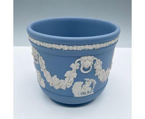Beautiful pale blue English pottery planter. In white cameo reliefs we encounter the scenes: Cupid as Oracle; The Graces; Bel