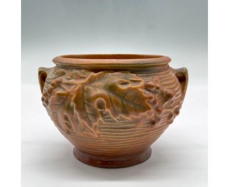 A small planter with relief details. Marked Roseville U.S.A 657-3. Issued: 1941Dimensions: 4.5"L x 4.5"W x 3.25"HManufacturer