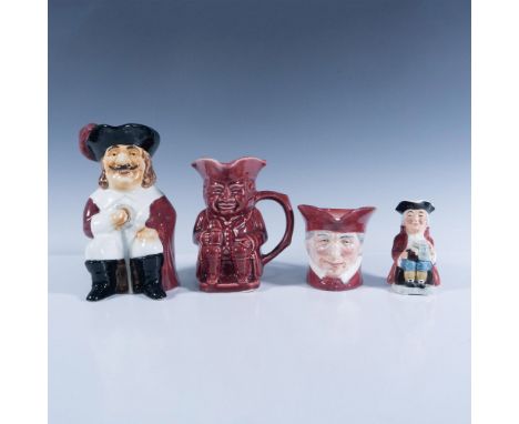 Four maroon-colored jugs featuring a Spanish soldier, a cardinal, an older colonial man with white hair, and a fully maroon-p