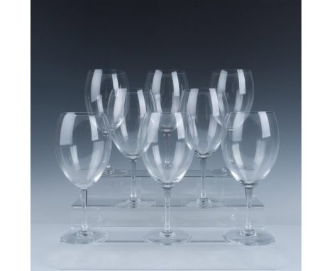 Simple elegance in each clear crystal glass. Baccarat acid mark. Issued: 20th centuryDimensions: 9.5"H x 4" dia. Manufacturer