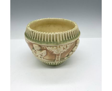 Lighter green to beige coloration with frieze of cherubs on circumference of the piece. 573. Issued: c. 1915Dimensions: 4"H x