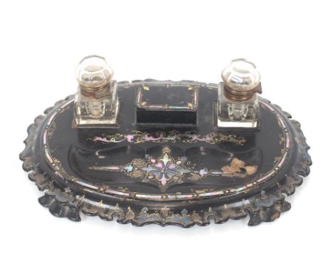 A Victorian papier mâché and mother of pearl inlaid desk stand; and a Victorian lacquered folding corner shelf (2)