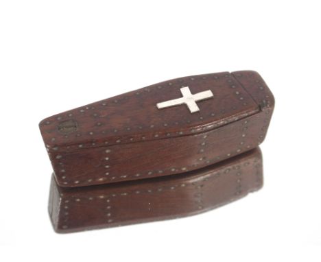 An antique wooden snuff box in the form of a coffin with silver cross to the top