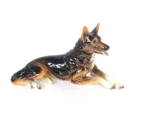 A Beswick figure of a horse 24cm long x 17cm high; and a Goebel porcelain figure of a reclining Alsatian 43cm long