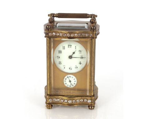A small late 19th Century carriage clock with alarm movement, the front set with cut paste stones, 13cm high
