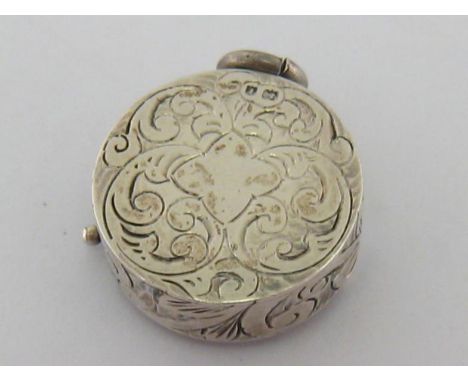 An Edwardian silver sovereign case, maker's mark JR (sans serif), Birmingham, 1905, engraved with scrollwork around a vacant 