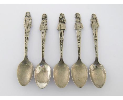 A set of five American silver plated teaspoons stamped "Carlton Silver Plate", each with different finial modelled as one of 