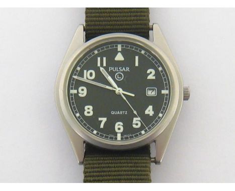 A British Army MOD surplus Pulsar G10 quartz wristwatch, issued 2004, marked to case back with NSN 6645-99 6052627, broad arr