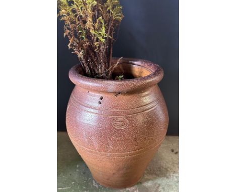 A brown salt glazed garden planter 