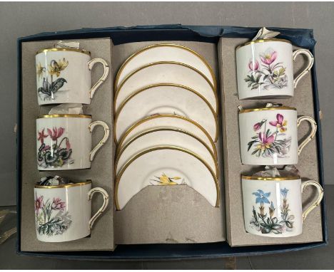 A Royal Worcester fine bone china boxed set of six coffee cans and saucers.