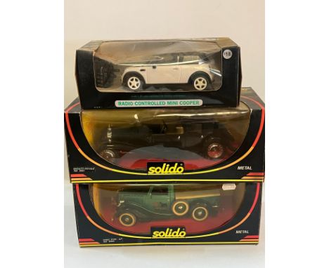 Three Diecast model cars, two by Solido 