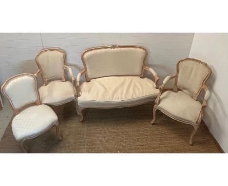 A Louis style two seater sofa with two open arm chairs and one extra chair 