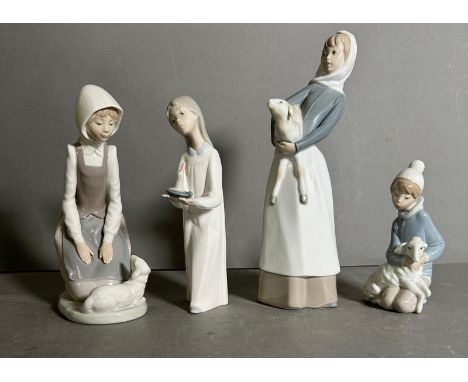 A selection of three Lladro and one Nao figures 