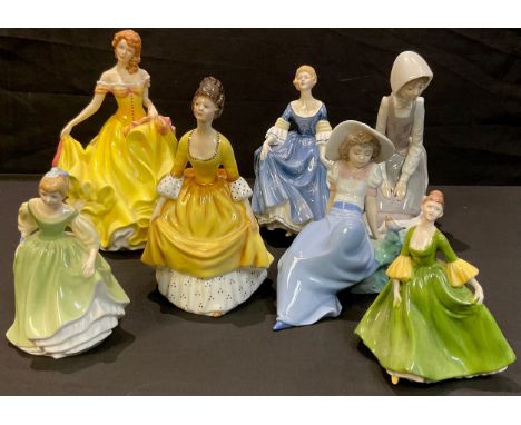 A Royal Doulton figure, Summer HN5322; others, Hilary HN2335; Coralie HN2307; two smaller; two Spanish Nao figures (7)