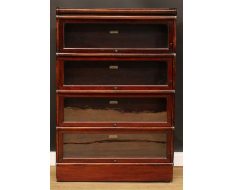 A Globe Wernicke barrister's bookcase, comprising four modular stacking sections, each bearing label for The Globe-Wernicke C