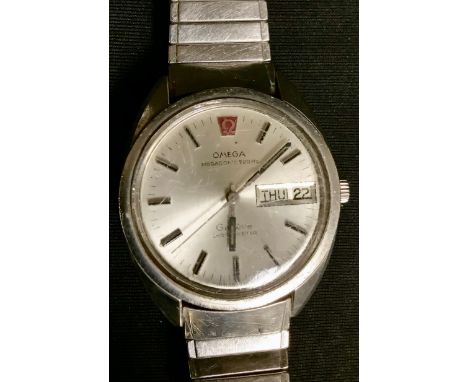 An Omega day/date Geneve Megasonic 720hz chronometer, on Omega bracelet 