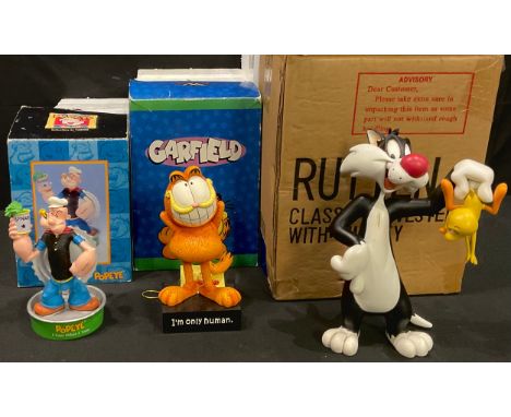 A Warner Brothers Looney Tunes model, Sylvester and Tweety Pie, 24cm, c.2000, boxed; another Popeye, 16cm, boxed; a Westland 