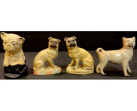 A pair of late 19th century continental bisque models of pug dogs, Who Said Kruger, 15cm; an English pottery model of a stand