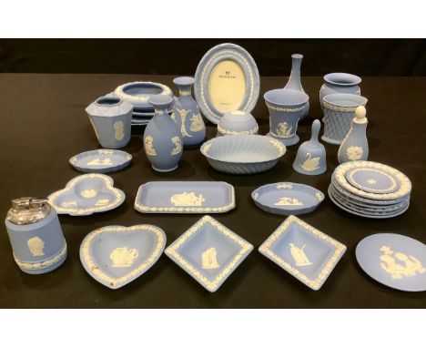 A collection of Wedgwood Jasperware including vases, dishes, plates, photograph frame, table lighter, etc, qty 