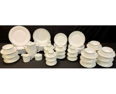 A Royal Doulton dinner and coffee service for twelve comprising dinner plates, salad plates, dessert bowls, side plates, soup