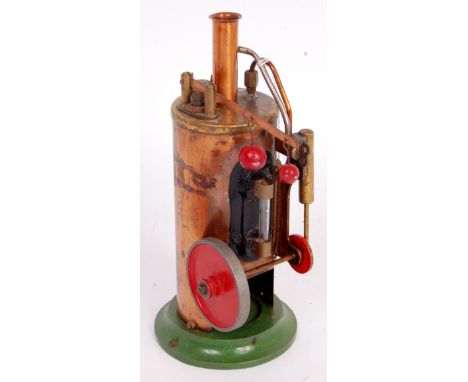 Burnac, England, small vertical steam engine missing burner copper clad boiler and copper chimney, weighted safety valve sigh