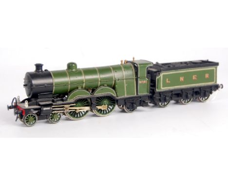 A white metal kit built and GNR Atlantic 4-4-2 engine and tender, finished in LNER Doncaster green livery as no. 3281 semi bu