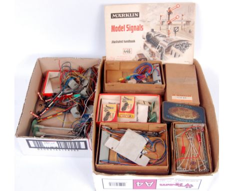 Boxed Marklin H0 electric signals 2x 7040 and 3x 7041 catenary masts etc, 8x 4099S (G-BG), a 446 model signals booklet (G), 4