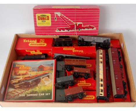 Triang items including R251 engine and tender, medium length maroon utility van and red. cream restaurant car, 7 wagons R345 
