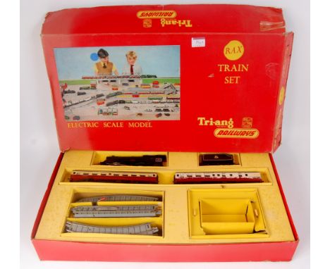 A Triang RAX train set containing black 'Princess Elizabeth' engine and tender, 2 coaches (one repainted), track oval (FG-BF)